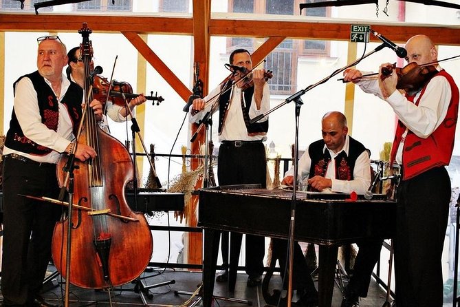 Czech Traditional Folklore Show including Dinner and Transport - The Show Itself: Colorful Costumes, String Instruments, and Audience Energy