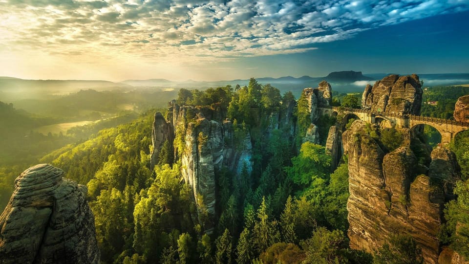 From Prague: Bohemian & Saxon Switzerland Iconic Day Trip - Getting Out of Prague: Pickup, Van Comfort, and Border Reality