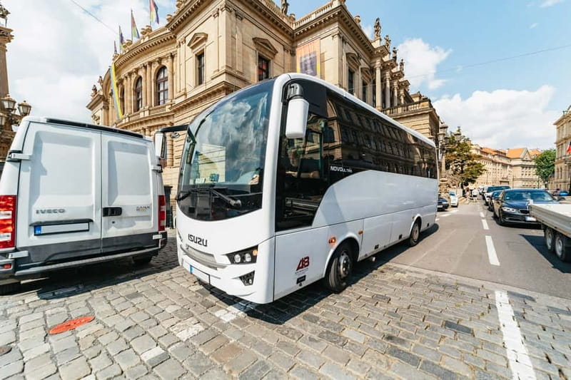 From Prague: Terezin Concentration Camp Guided Tour w/ Audio - On the bus: the phone audio guide does the heavy lifting