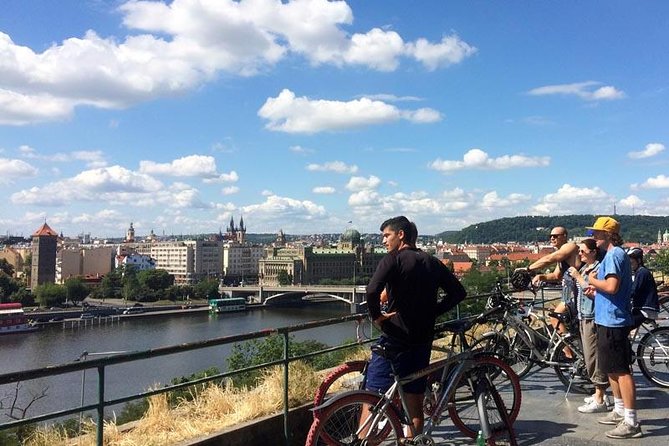 Full-Day All-in-One Electric Bike Tour of Prague (7hrs) - Cernin Palace, Strahovsky Klášter, and National Theatre in motion