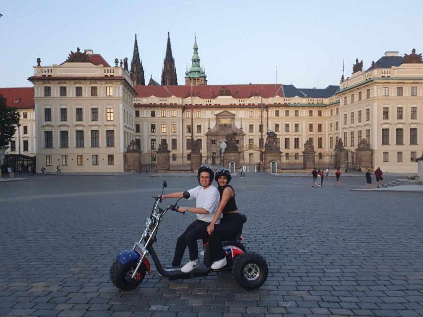 Grand City Tour on Electric Trike in Prague - Live Guided - Prague Castle area from outside: Strahov Monastery, stadium views, and Petrin Hill