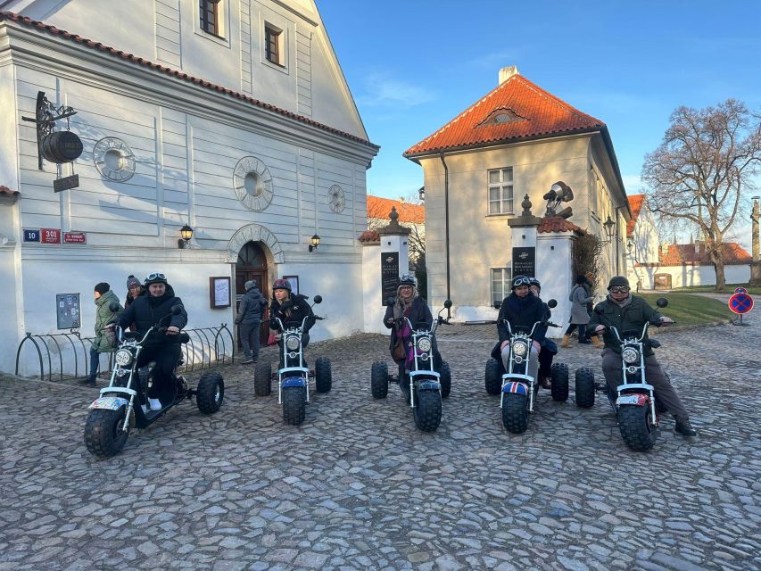 Grand City Tour on Electric Trike in Prague - Live Guided - Old Town icons on wheels: Lennon Wall, Charles Bridge views, Kafka Museum area, and Old Town Square