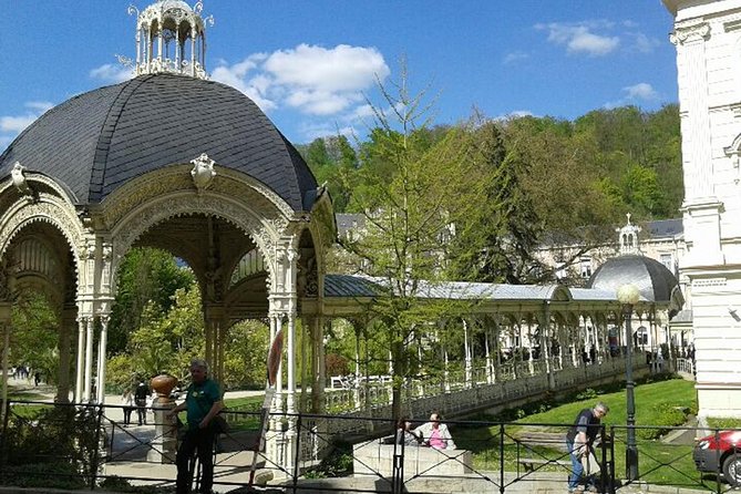 Karlovy Vary day trip from Prague with lunch - Walking the Karlovy Vary historical center: colonnade energy with guidance