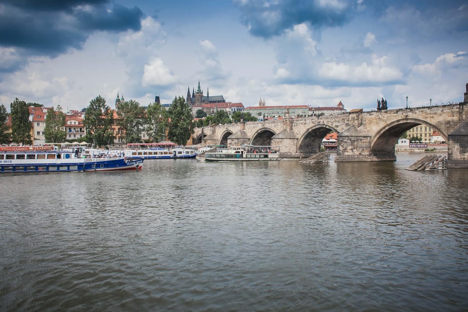 Prague: An unforgettable 2-hour cruise on the Vltava River. - Prague Castle towering above the river: the view that sets the tone