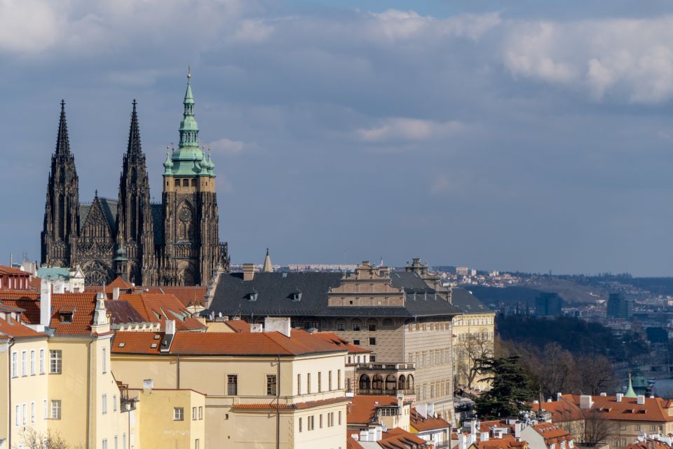 Prague: Castle Grounds & Highlights Walking Tour small-group - Old Royal Palace exteriors: warm colors you’ll notice fast