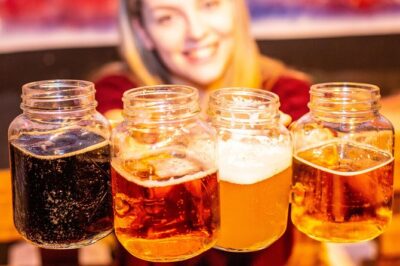 Prague Craft Beer Tour: 8 Czech Beers, Taproom & Best Beer Garden - Stop 1 at Drunken Monkey: four beers plus beer etiquette