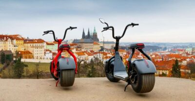 Prague: Fat Tire E-Scooter Guided Tour - Starting at Saská 7: a clever base near the river and the castle approach