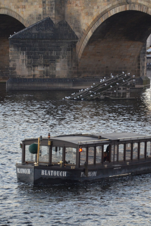 Prague: Old Town Guided Walking Tour and City Boat Ride - The Vltava boat ride: 1 hour, headsets, and Prague Castle viewpoints
