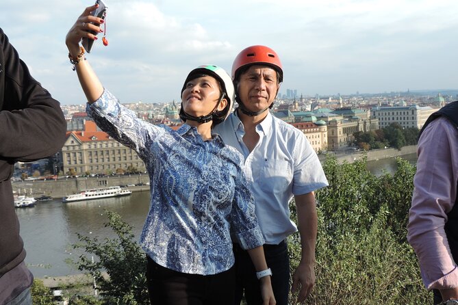 Prague Panoramic Views e-bike and e-Scooter guided Tour - Lennon Wall and Charles Bridge: photos, history, and quick cultural hits